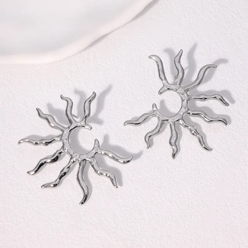 Aretes Plateados Medio Sol