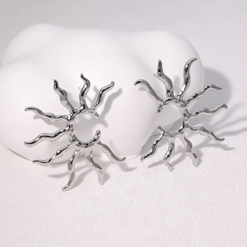 Aretes Plateados Medio Sol