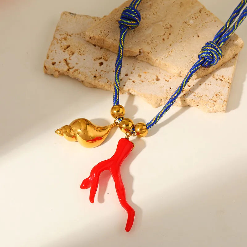 Collar Cordón Azul Dijes Coral y Caracol
