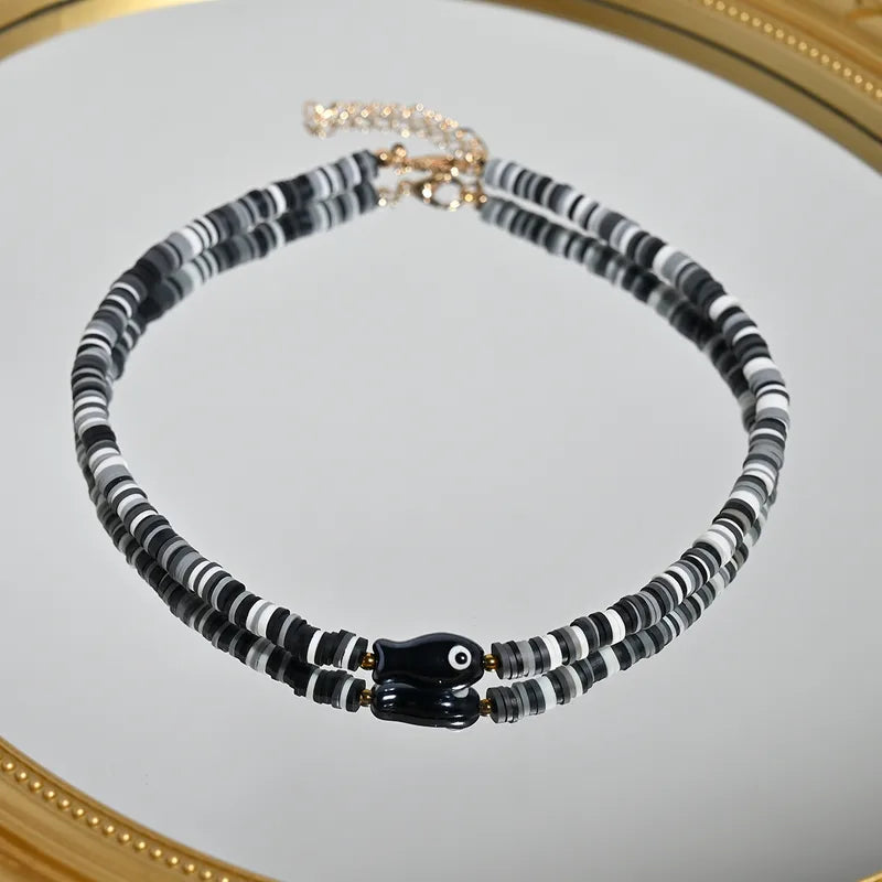 Collar Cuencas Negras, Blancas y Grises con Pez