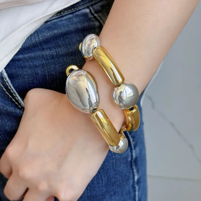 Pulsera Dorada CCB Gotas Grandes y Medianas Plateadas