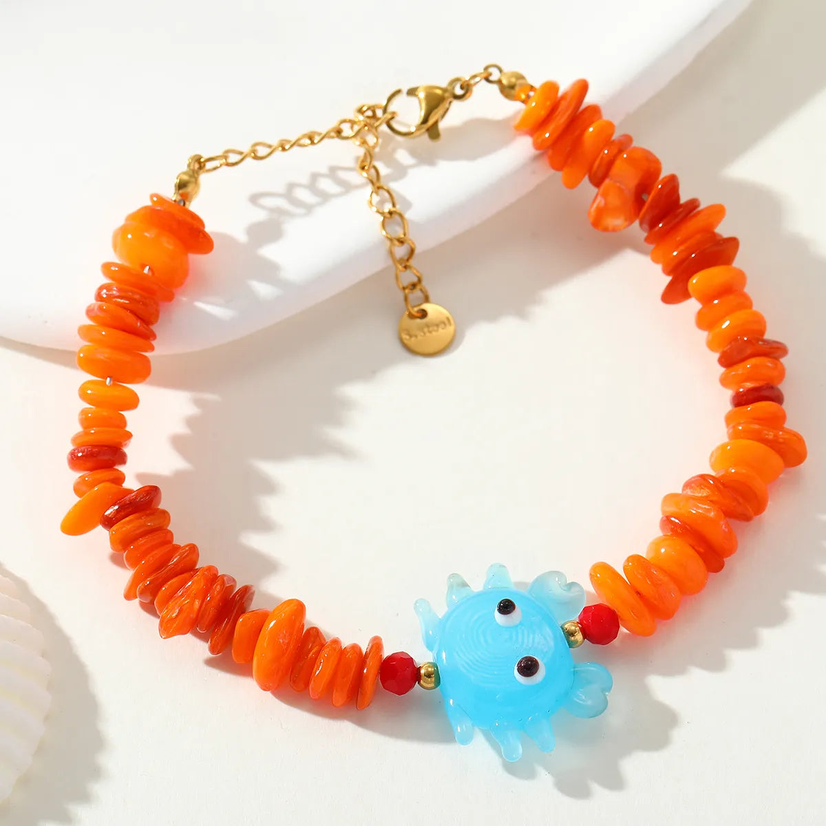 Pulsera con Cuentas Laminadas Naranjas Cangrejo Azul