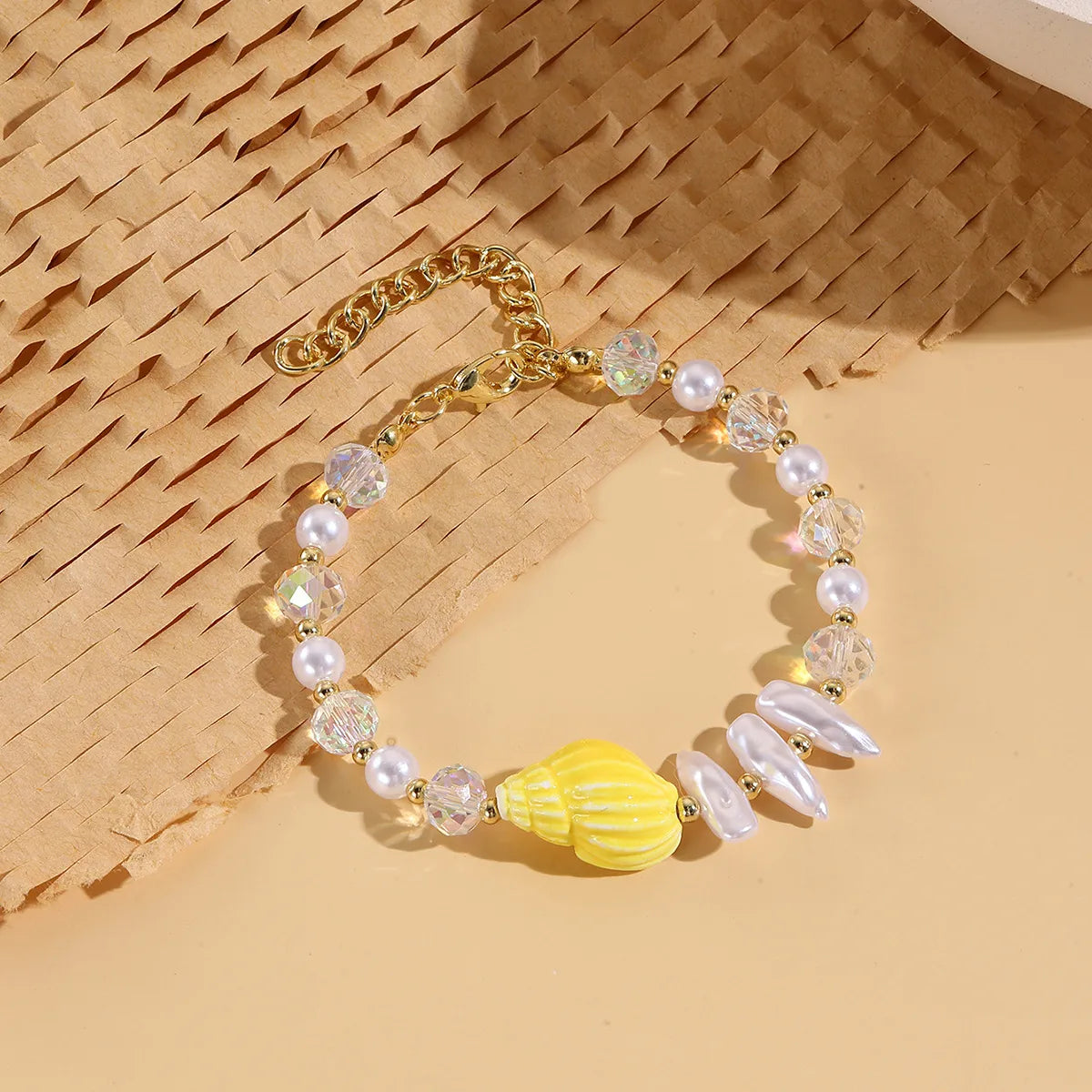 Pulsera de perlas y Caracol Blanco
