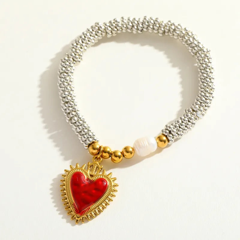 Pulsera Plateada Elástica, Perla y Dije Corazón