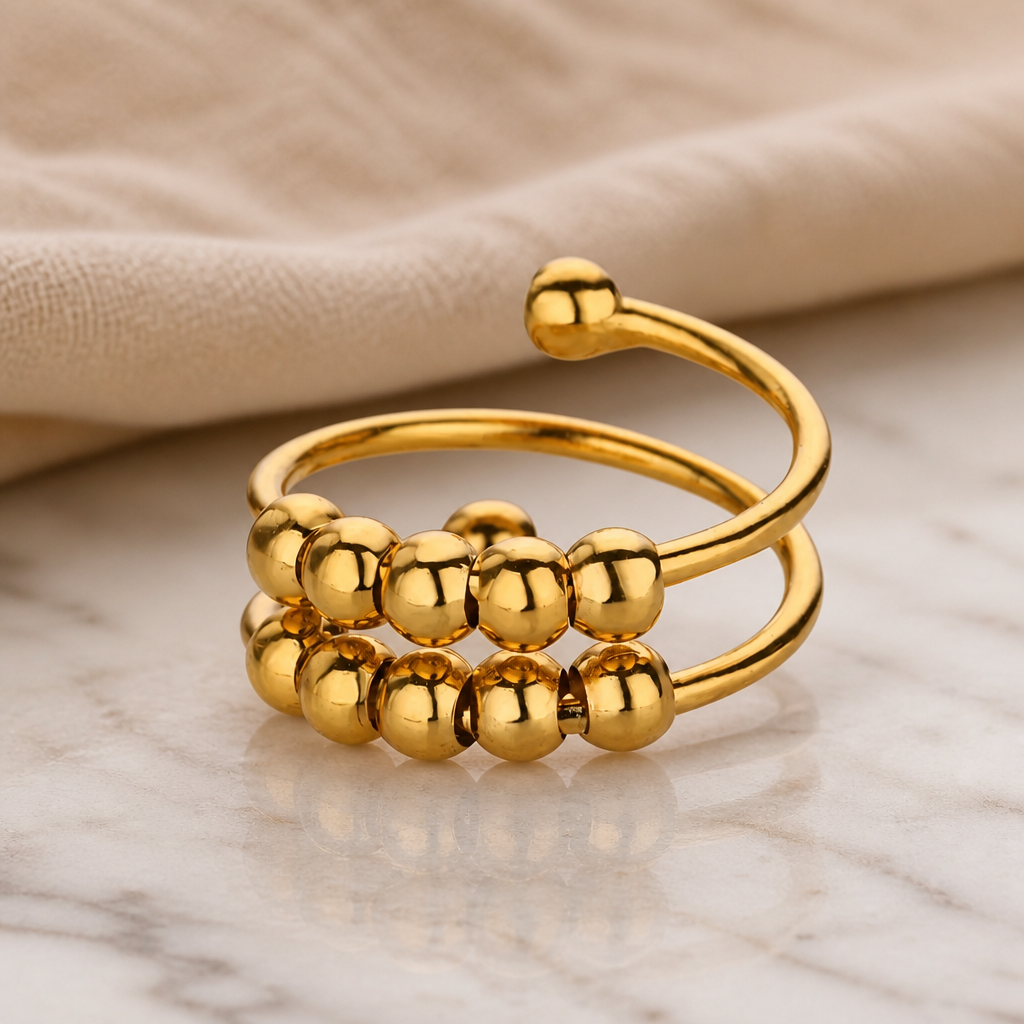 Anillo Dorado Tipo Espiral con Cuencas Doradas - Ajsutable