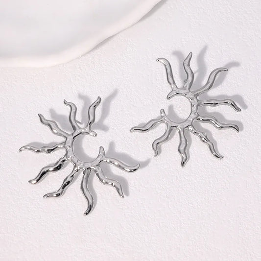 Aretes Plateados Medio Sol