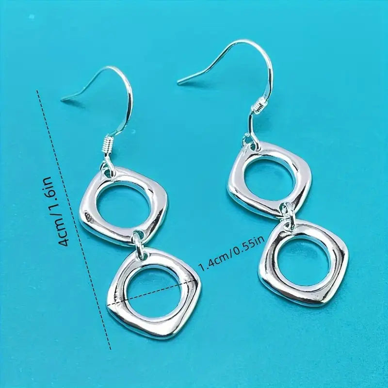 Aretes Plateados Diseño Geométrico