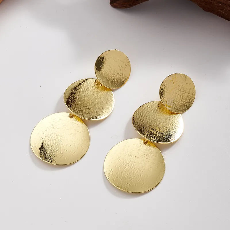 Aretes Dorados Triple Círculo