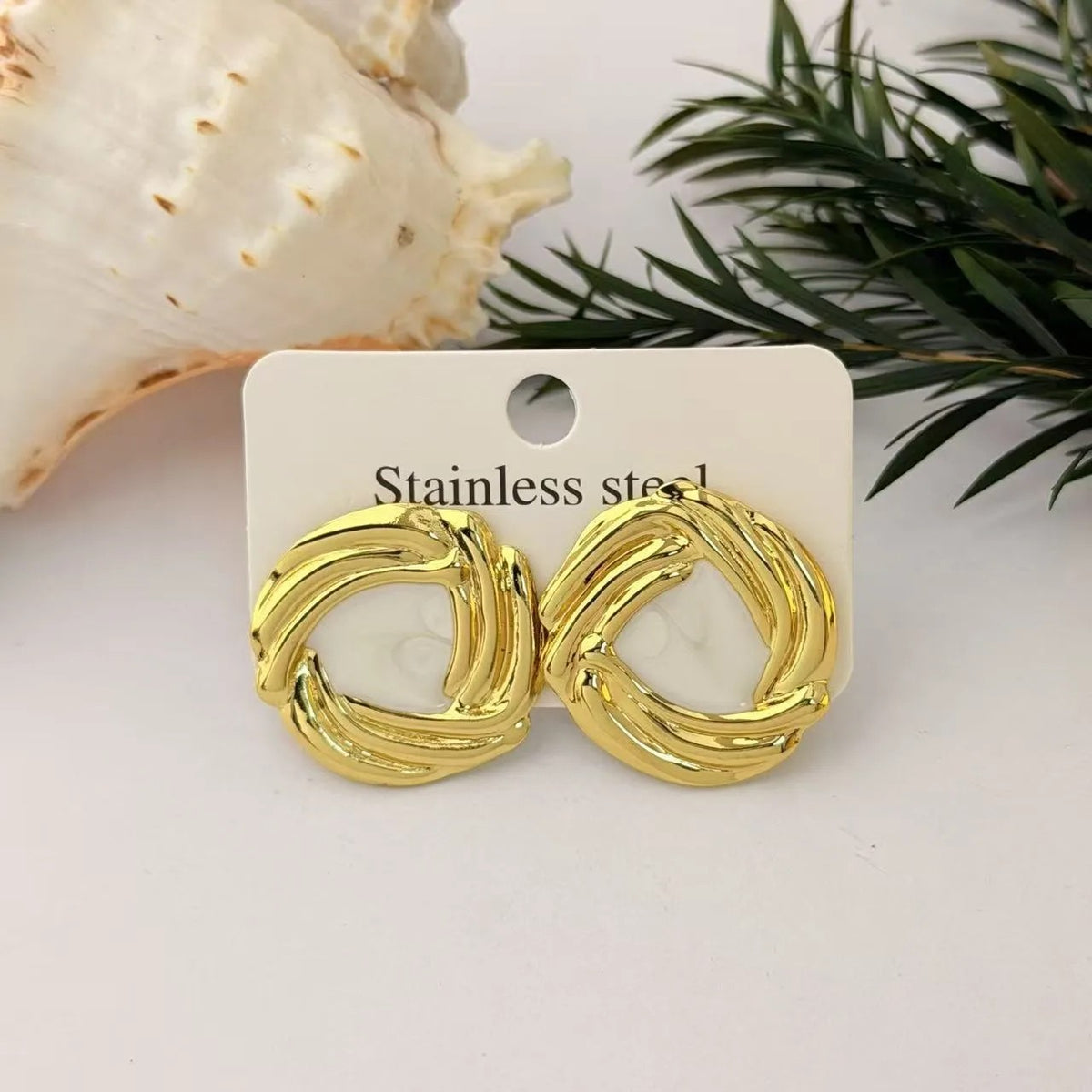 Aretes Nudo Trenzado Dorado