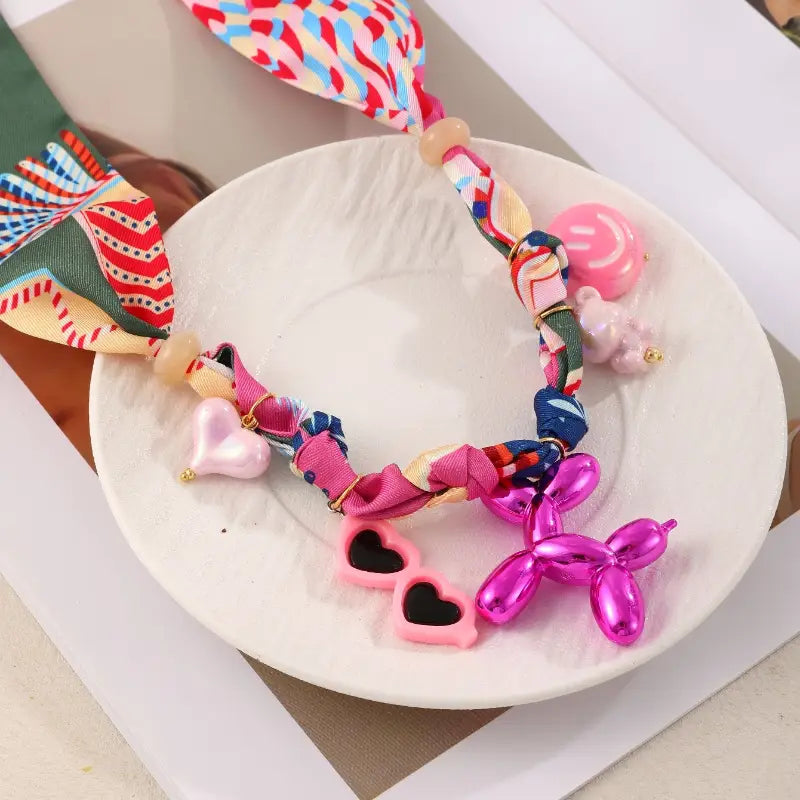 Collar Paliacate Dijes Varios Perro Globo Tonos Rosa