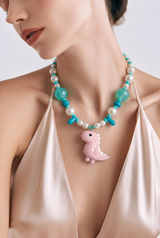 Collar Cuencas Turquesa y Aperladas Dije Dinosaurio Rosado