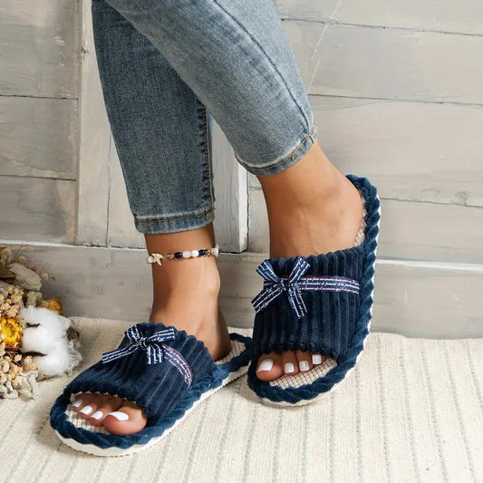 Pantufla y Moño Azul