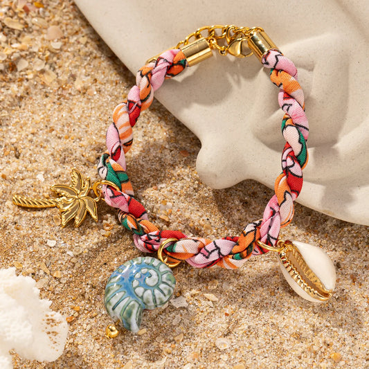 Pulsera Tela Trenzada Caracoles