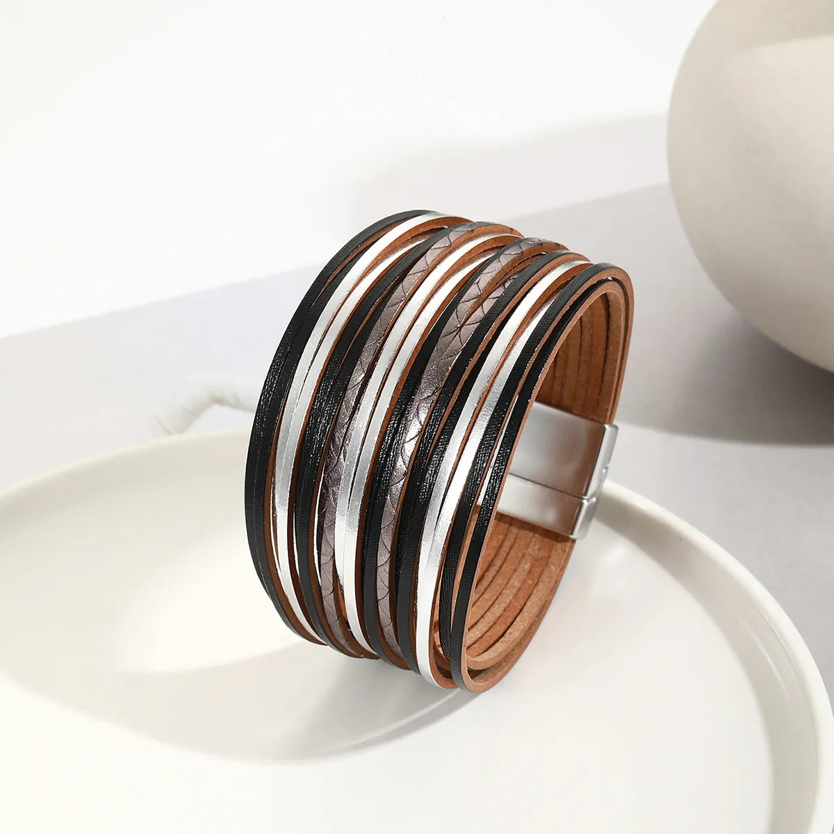 Pulsera  Tricolor: Negra, Plata y Acero