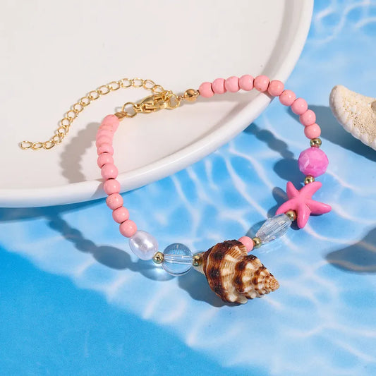 Pulsera Cuencas Rosas y Dijes Marinos