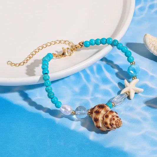 Pulsera Cuencas Turquesa y Dijes Marinos
