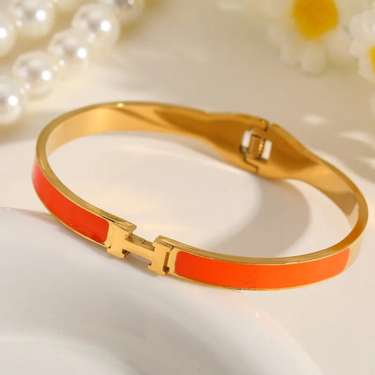 Pulsera Dorada Tipo Pulso Acabados Naranja