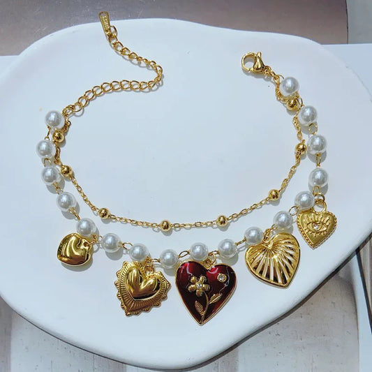 Pulsera Doble Cadena Dorada y Perlas Dijes Corazones